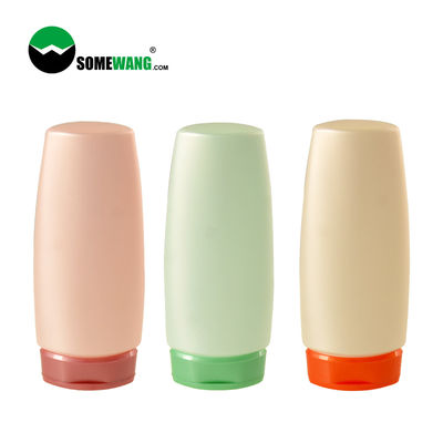 シャンプーの使用PEのプラスチックびん200mlはフリップ上のふたが付いている平らな圧搾のびんをカスタマイズした